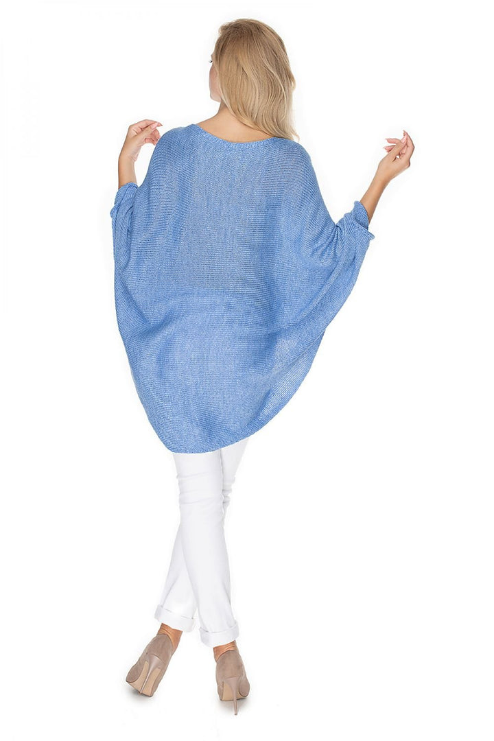 Ponchos With A Loose Cut PeeKaBoo