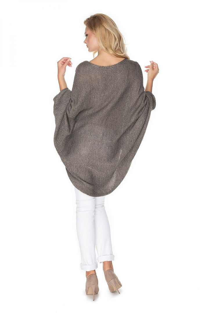 Ponchos With A Loose Cut PeeKaBoo