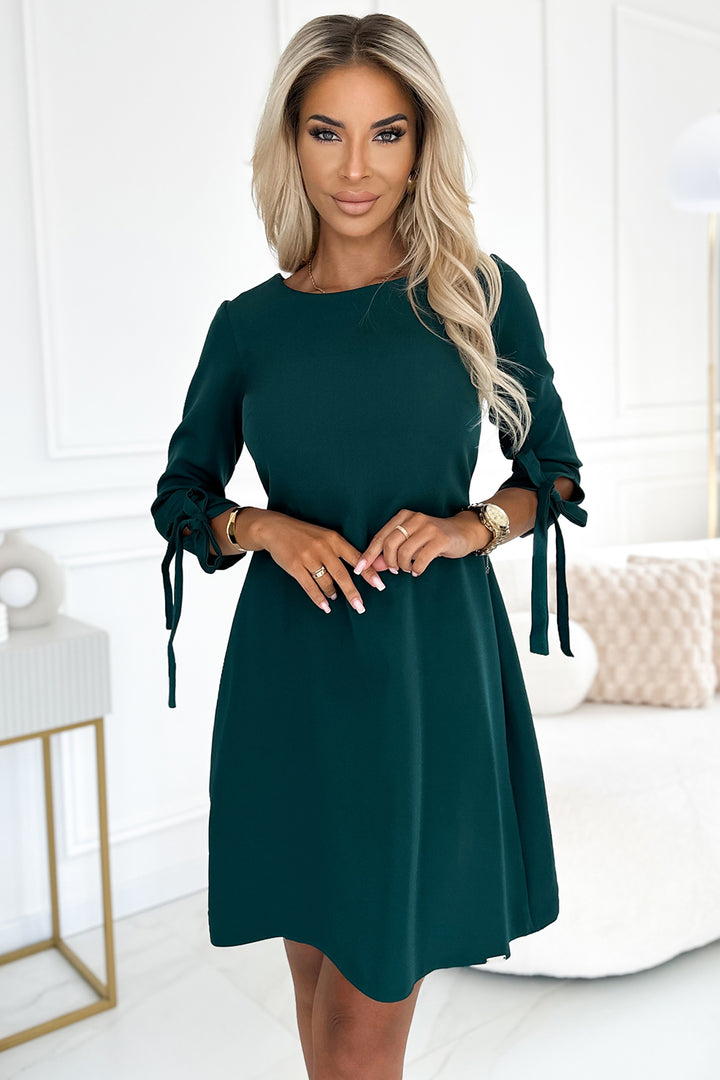 Trapeze dress with bows - green