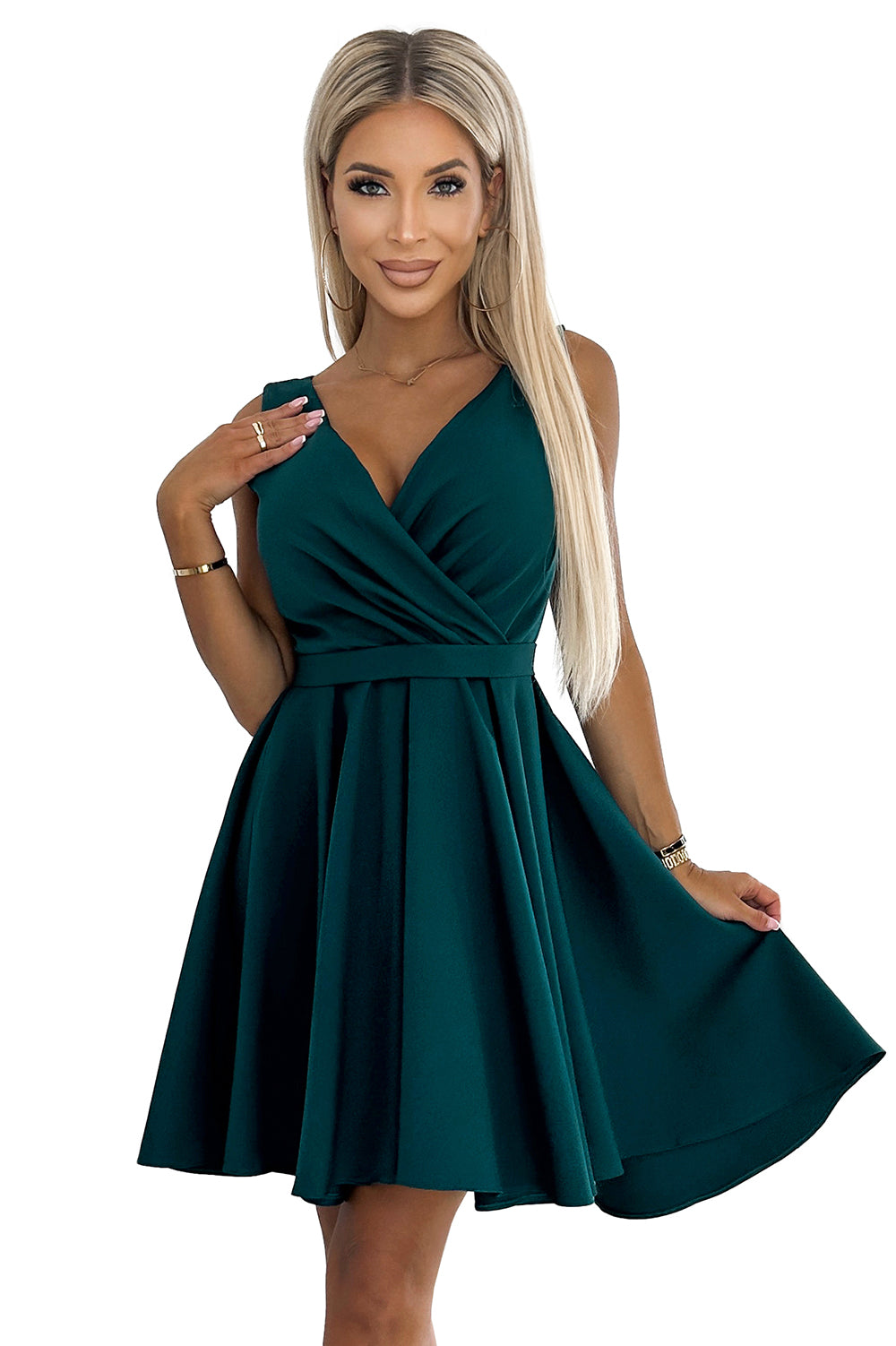 Dress with longer back; neckline and belt - green