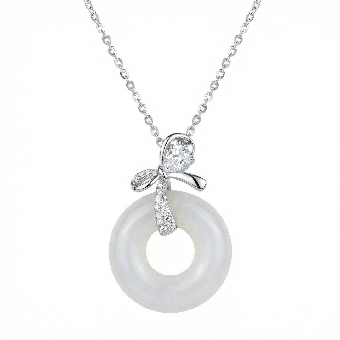 925 Sterling Silver Elegant White Jade Donut Pendant Necklace with Sparkling Silver Bow Accent