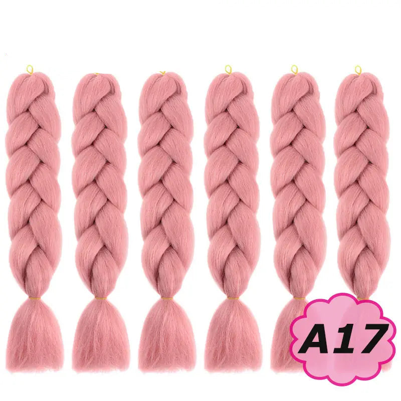 Pink braided hair extensions with  on a white background.