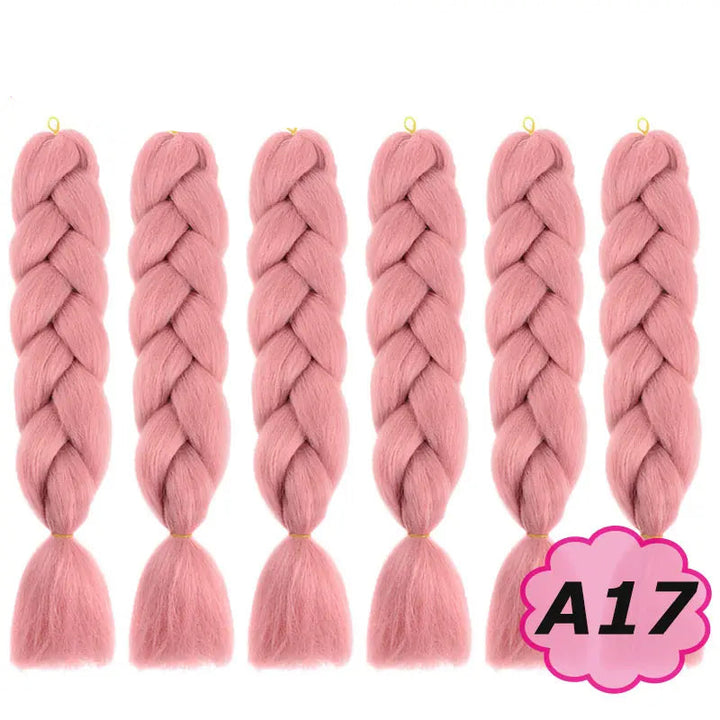 Pink braided hair extensions with  on a white background.