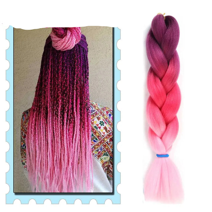 Braided hair extensions with pink and purple gradient on a plain background