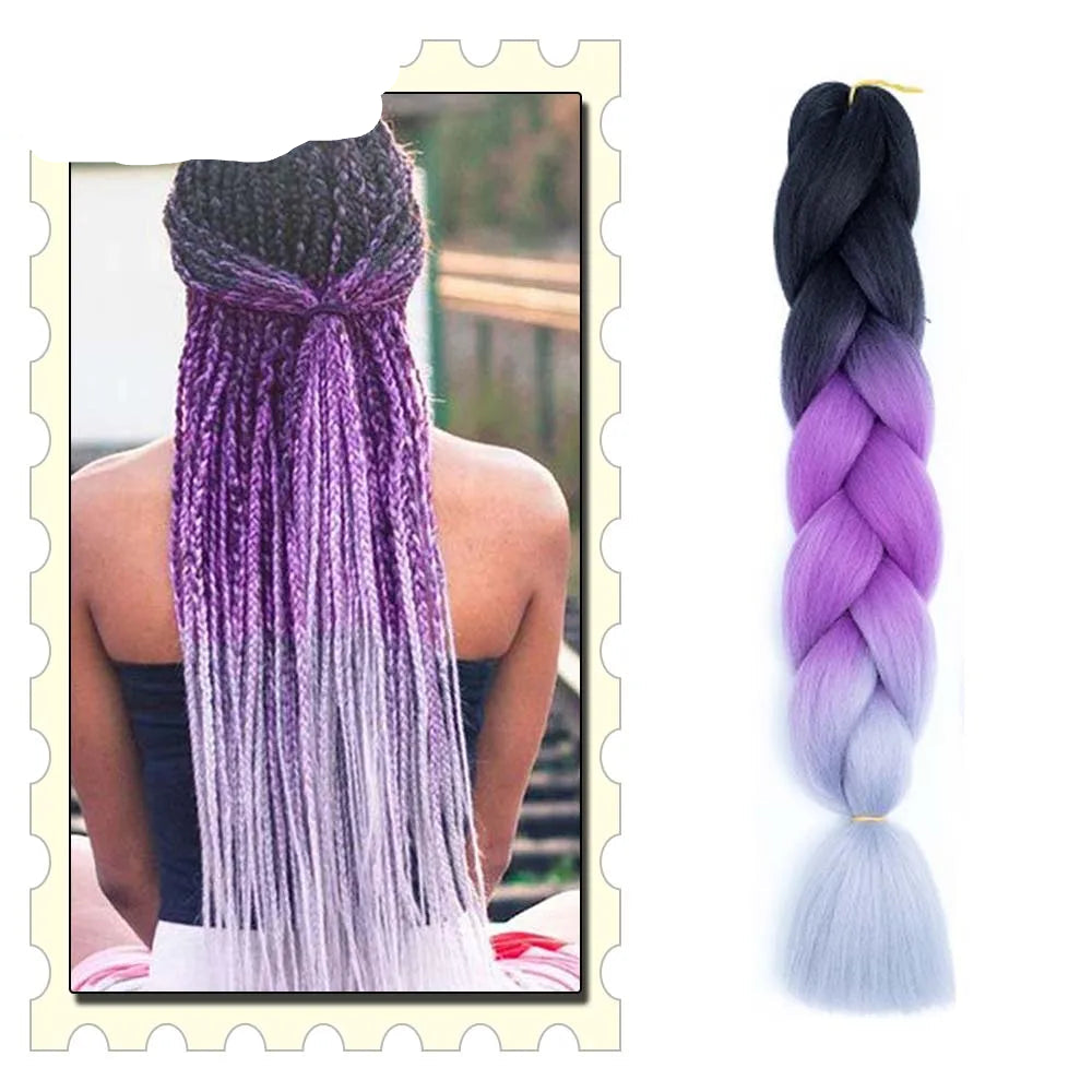 Purple and black braided hair extensions with a person wearing them