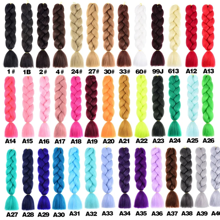 Collection of braided hair extensions in various colors on a white background