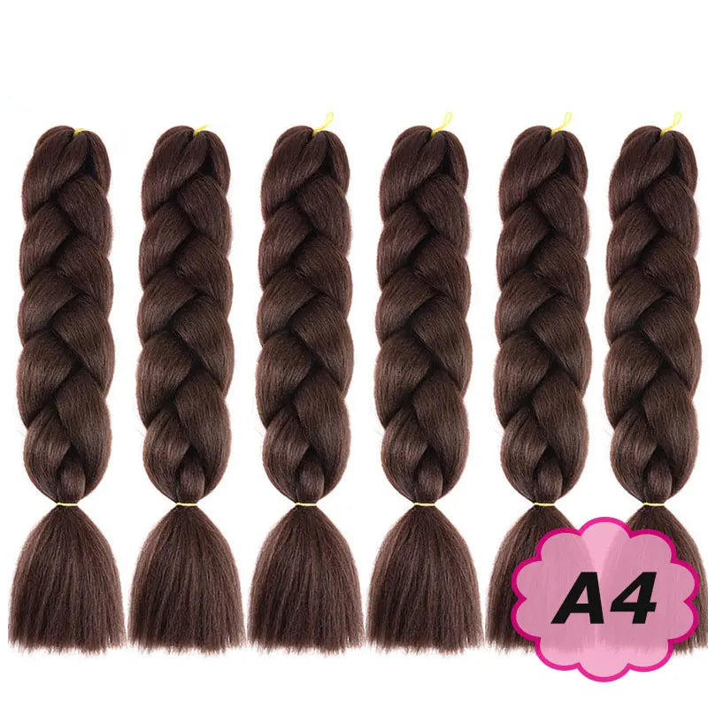 Set of braided hair extensions with on a white background.