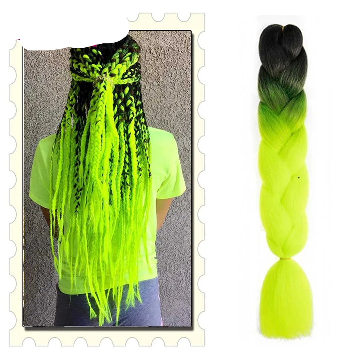 Neon green and black braided hair extensions with a person wearing them