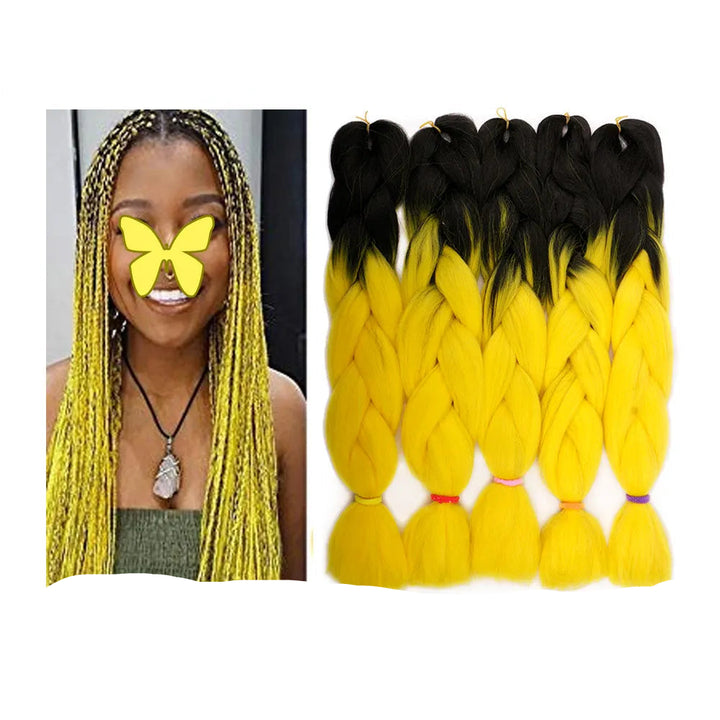 Yellow and black braided hair extensions with a woman wearing yellow braids 