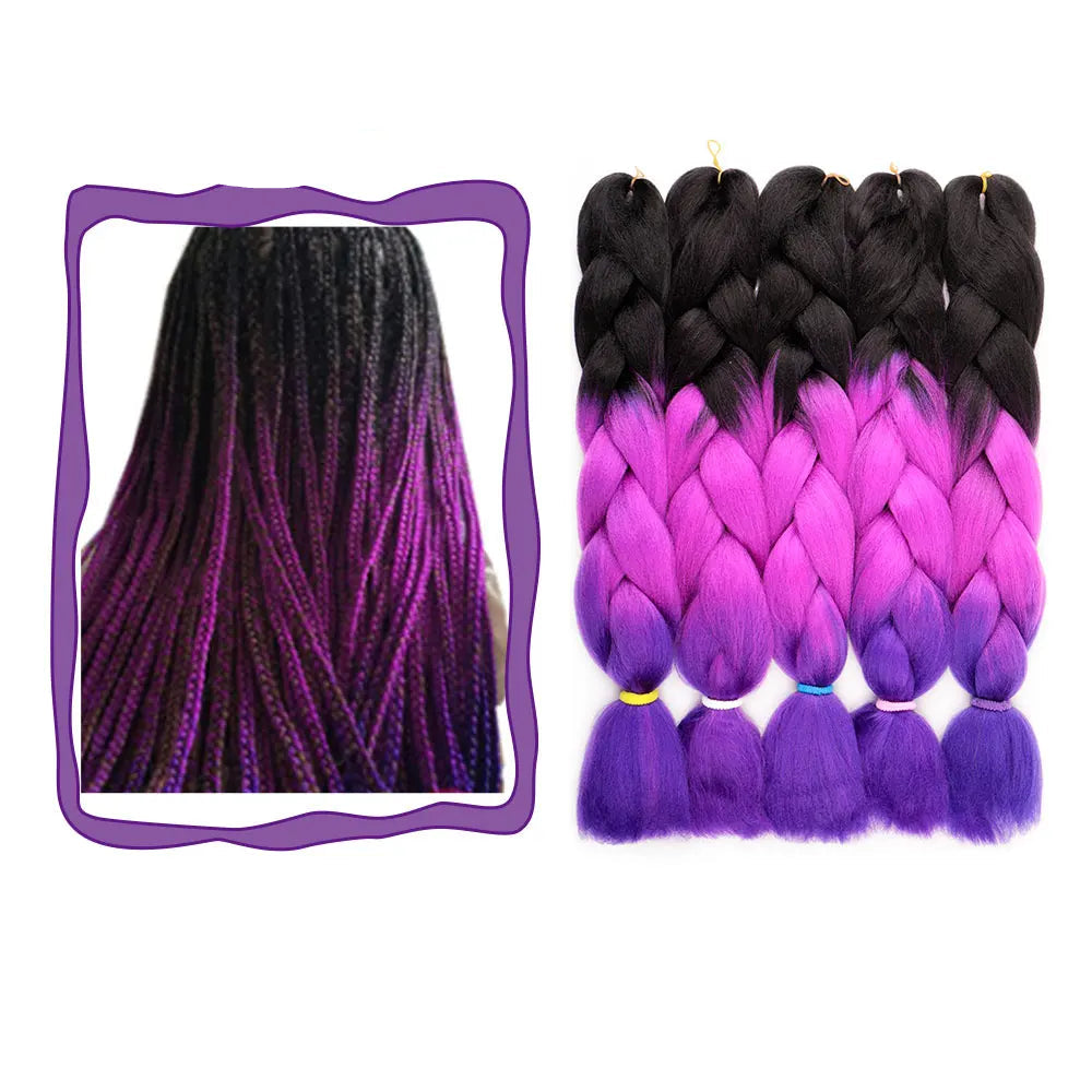 Black to purple ombre braided hair extensions with a mirror reflection on a white background