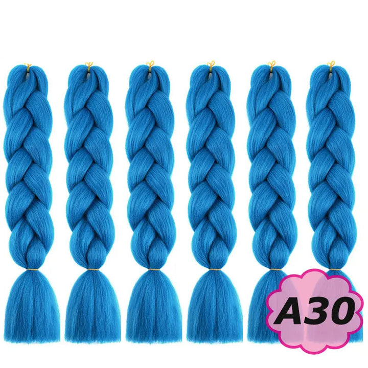 Blue braided hair extensions on a white background