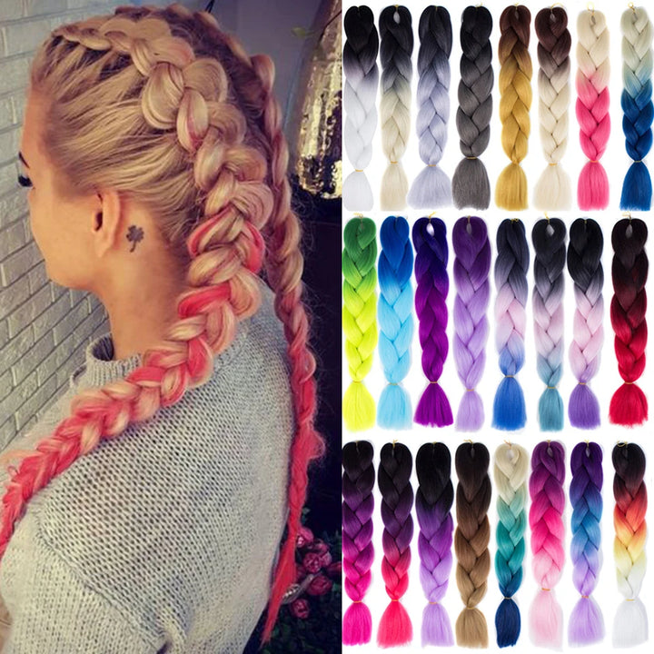 Woman with braided hair and a color chart of braided hair extensions.