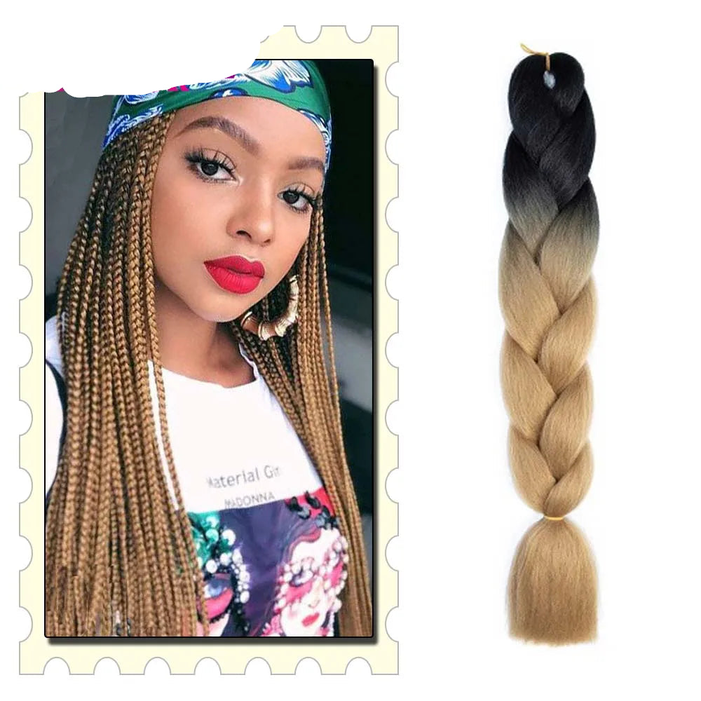 Woman with styled hair and a braid extension with ombre color on a  background.