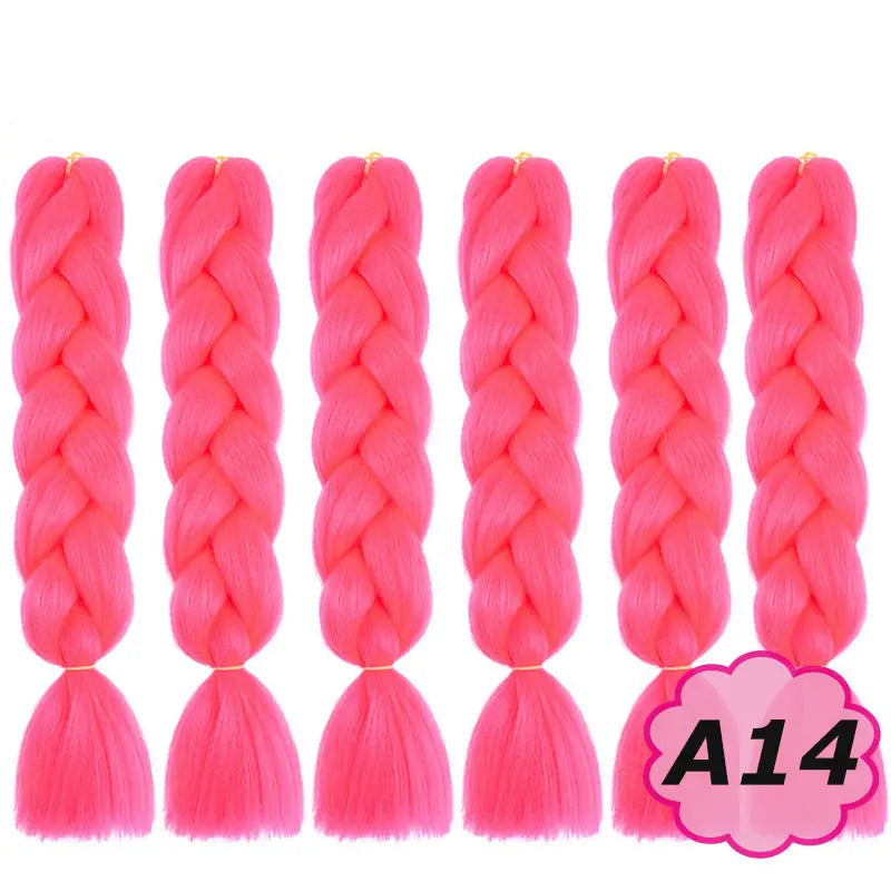 Pink braided hair extensions with  on a white background.