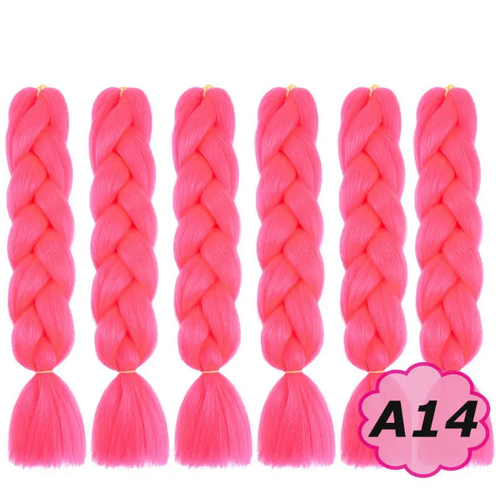 Pink braided hair extensions with  on a white background.