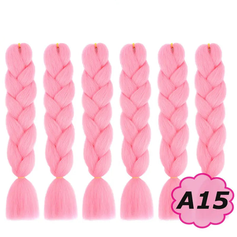 Pink braided hair extensions with  on a white background.