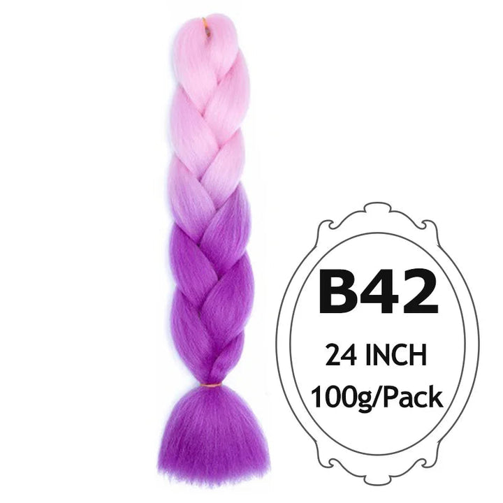 Purple and pink braided hair extension with on a white background.