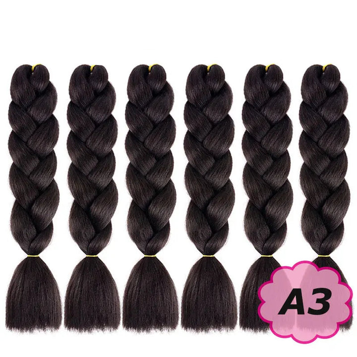 Set of braided hair extensions with  on a white background.