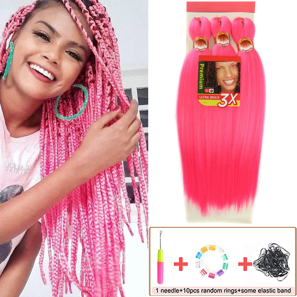 Woman with pink braided hair and packaging of pink hair extensions with accessories.