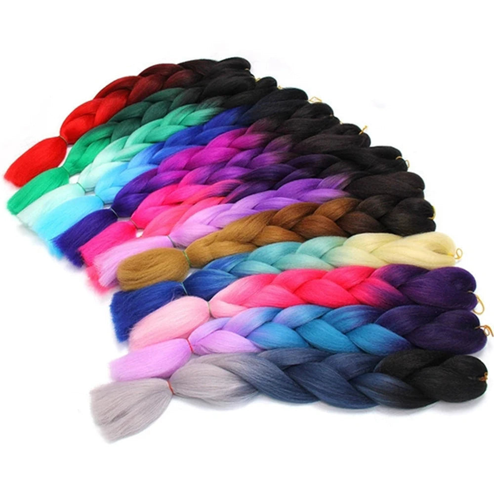 Colorful braided hair extensions with  on a white background.