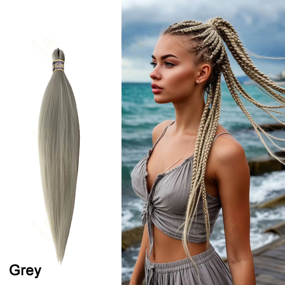Gray hair extensionnext to a woman with braided hair by the ocean.