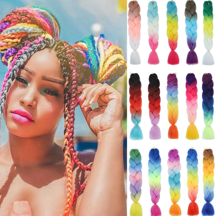 Woman with colorful braided hair and a display of rainbow-colored braids.