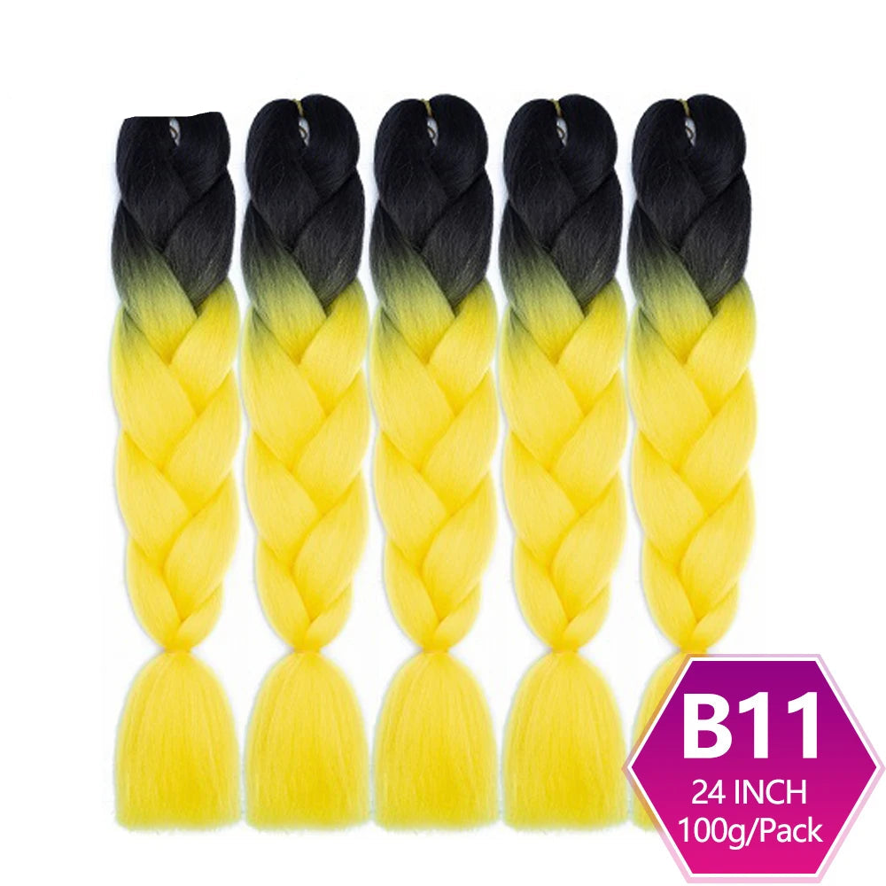 Five braided hair extensions with black to yellow gradient