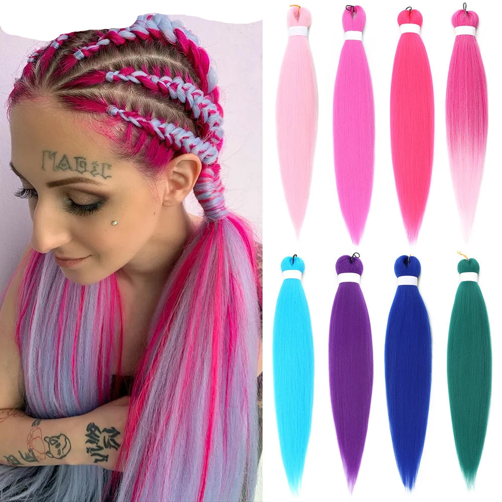 Woman with colorful braided hair and hair extensions in pink, blue, purple, and green.