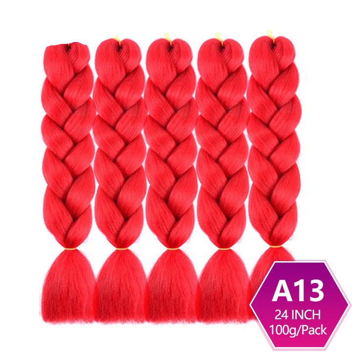 Red braided hair extensions with on a white background