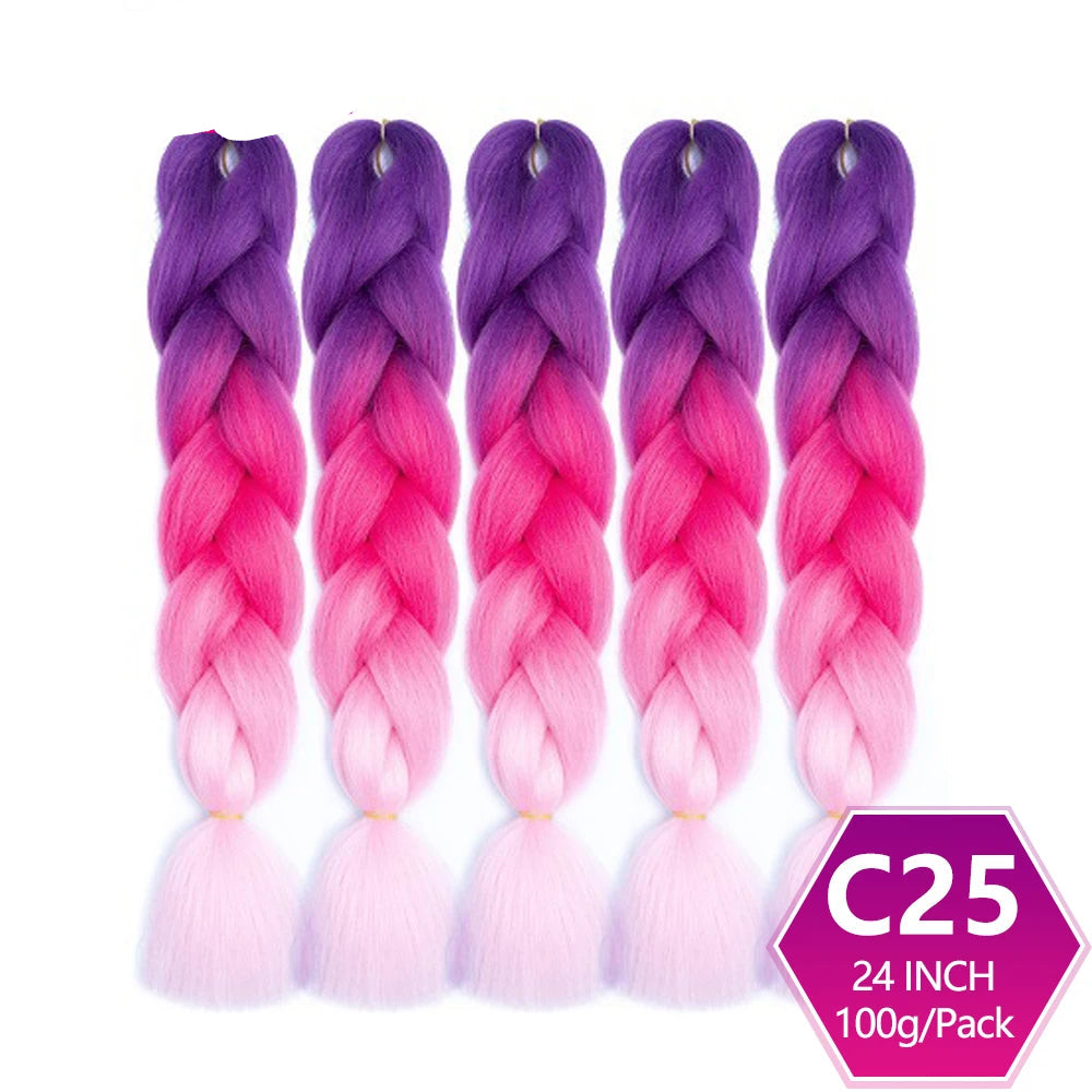 Purple to pink ombre braided hair extensions with on a white background.