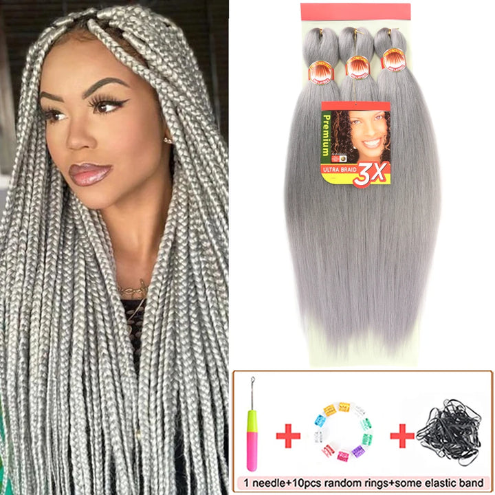 Woman with silver braided hair and a package of synthetic hair extensions with accessories.