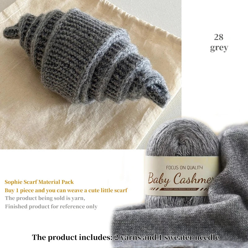 Gray yarn skein with a label on a textured surface, featuring text about a scarf material pack.