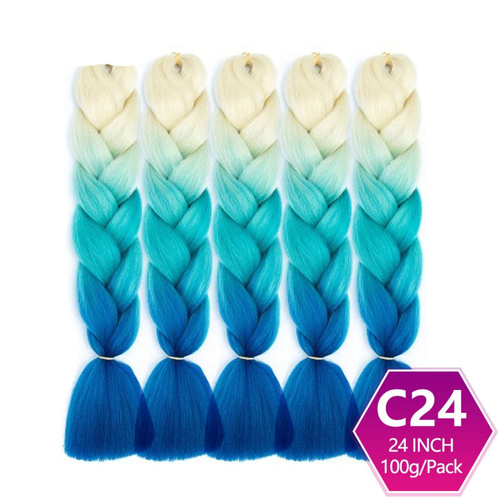 Blue and green ombre braided hair extensions with on a white background.