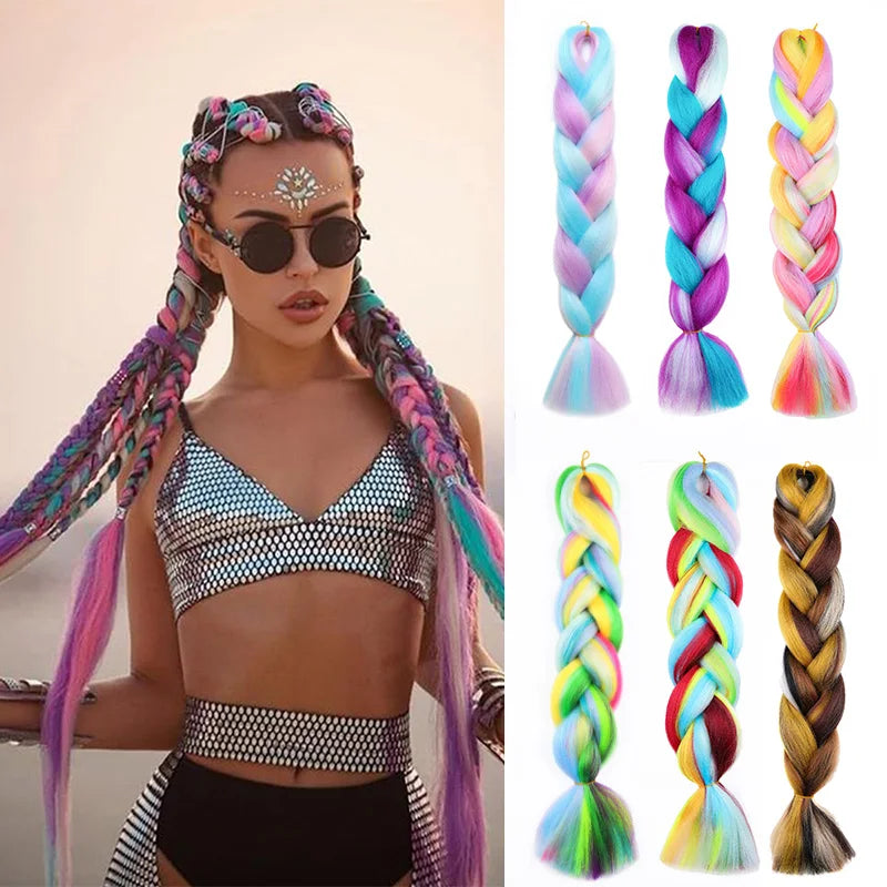 Woman with colorful braided hair extensions and a display of various braided hair extensions.