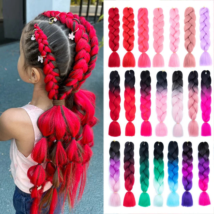 Child with red braided hair extensions and color chart on the side