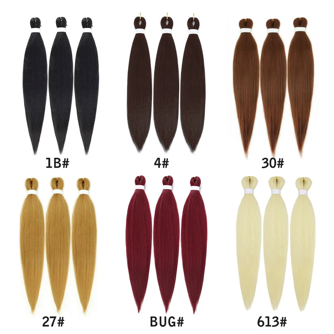 Collection of hair extensions in various colors on a white background