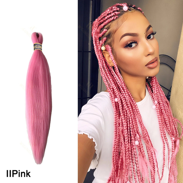 Woman with pink braided hair and a pink hair extension