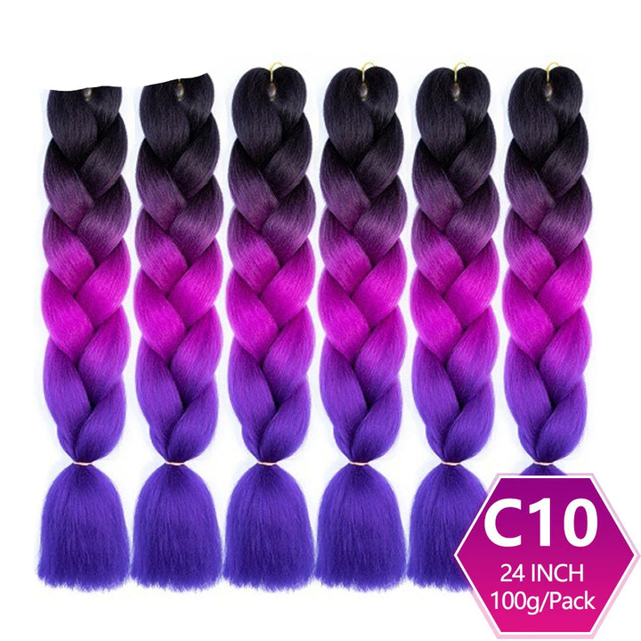 Purple and pink braided hair extensions with on a white background.