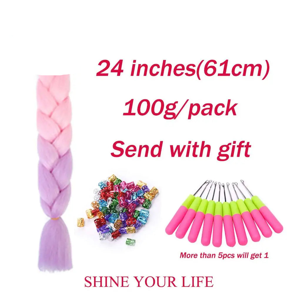 Hair braiding set with pink and purple braided hair, colorful beads, and green-handled tools on a white background.