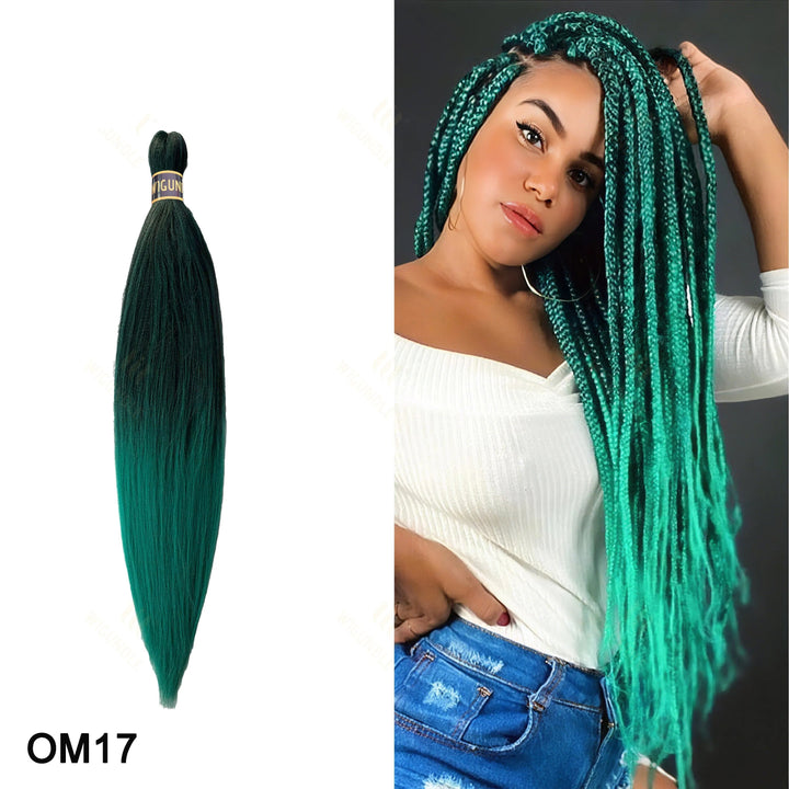 Green braided hair extensions with a model wearing them