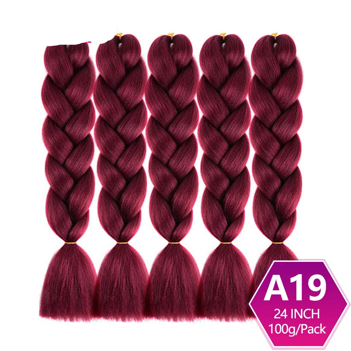 Five burgundy braided hair extensions with on a white background.