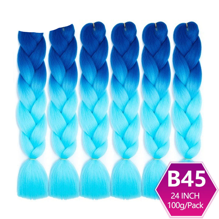 Blue ombre braided hair extensions with on a white background.