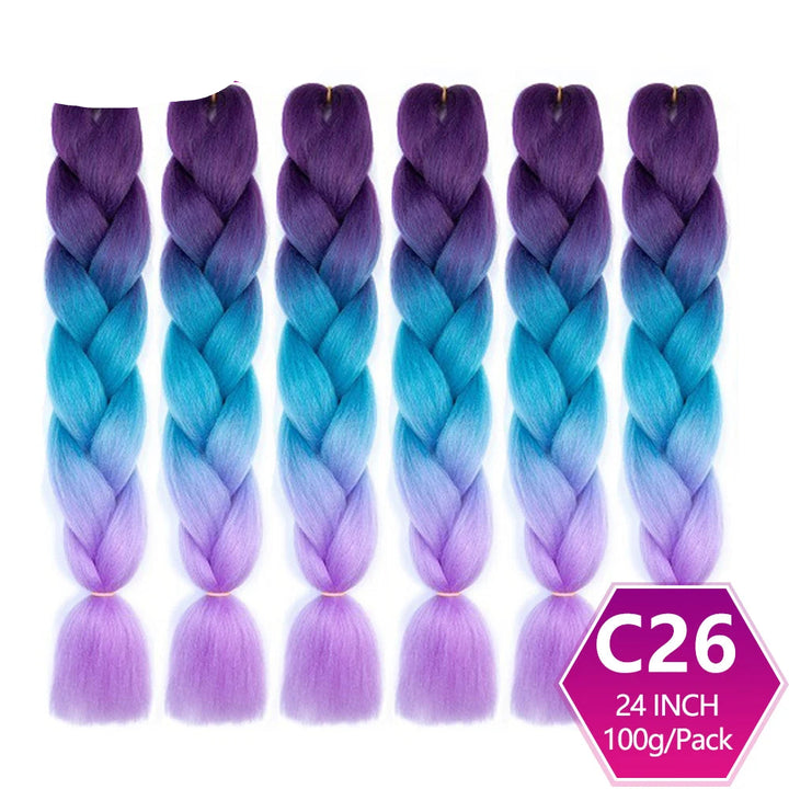Purple to blue ombre braided hair extensions with on a white background.