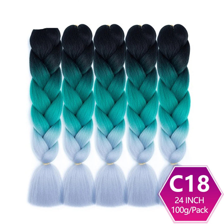 Five braided hair extensions with gradient color from black to blue and white