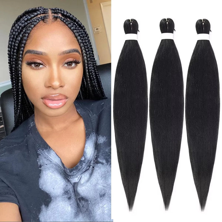 Woman with styled hair and three bundles of black hair extensions.