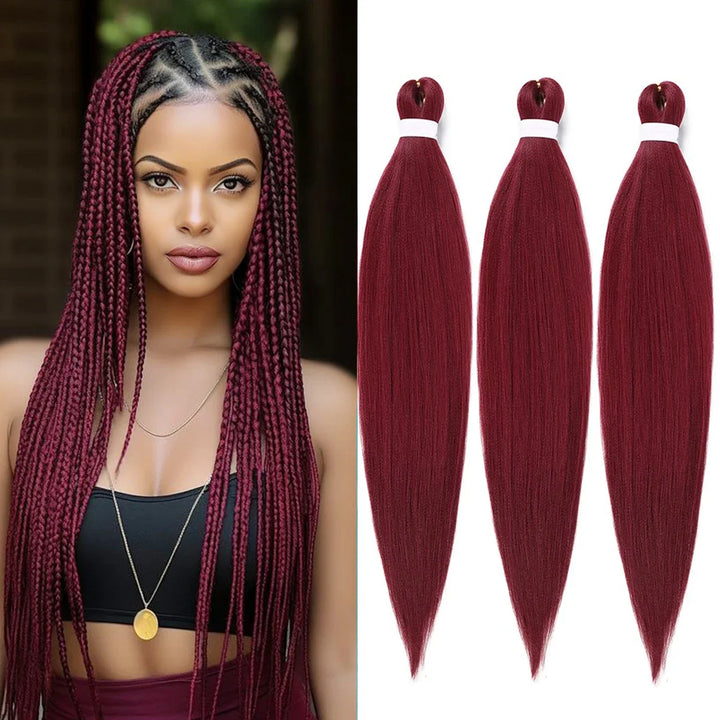 Woman with burgundy braided hair and three bundles of burgundy hair extensions.