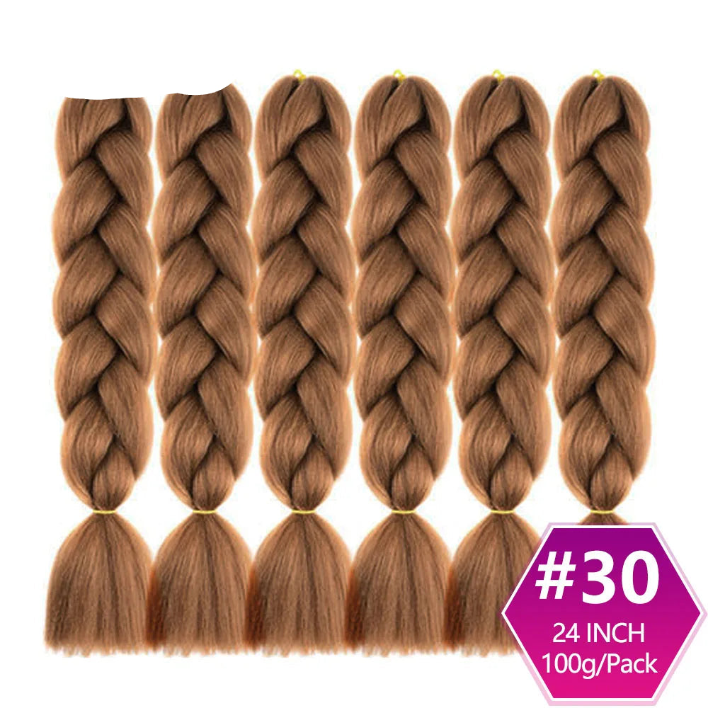 Set of braided hair extensions with  on a white background.