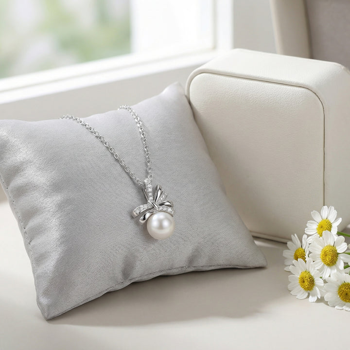 ✨ 925 Sterling Silver Elegant Bow Knot Pendant Necklace with White Pearl & Sparkling Accents ✨