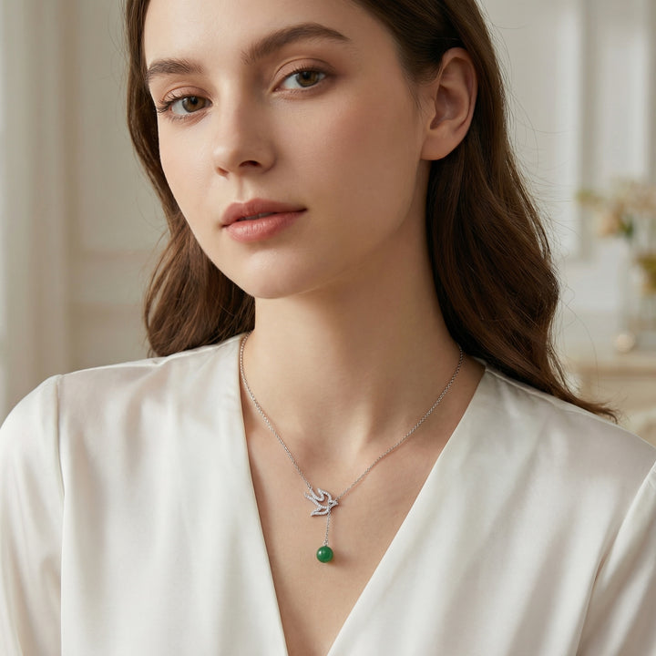 925 Sterling Silver Bird Necklace with Green Jade Bead – Sparkling Accent Design