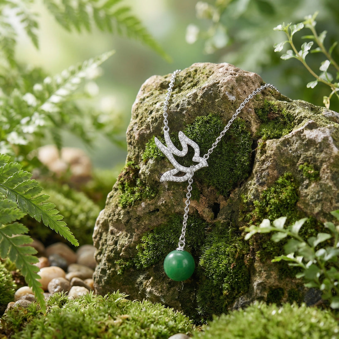 925 Sterling Silver Bird Necklace with Green Jade Bead – Sparkling Accent Design